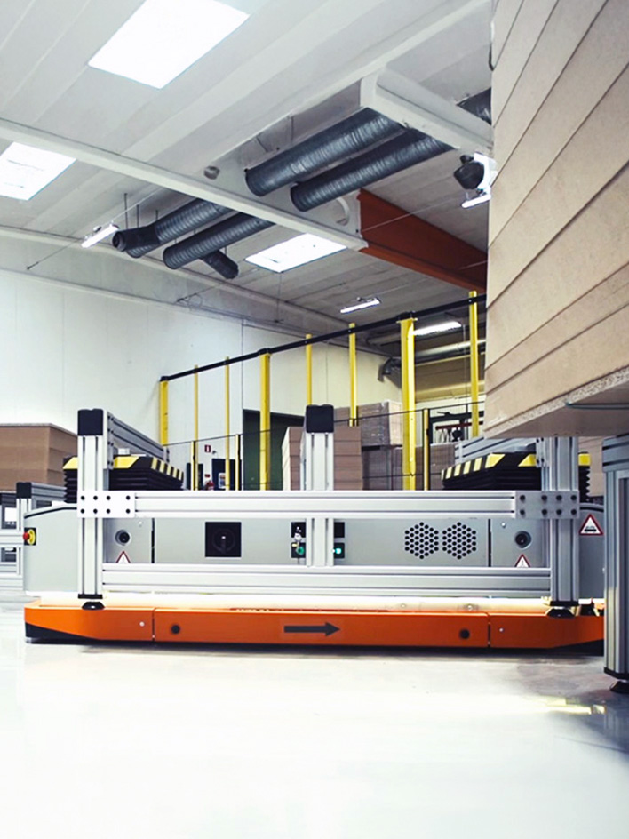 Industrial mobile robot in warehouse aisle